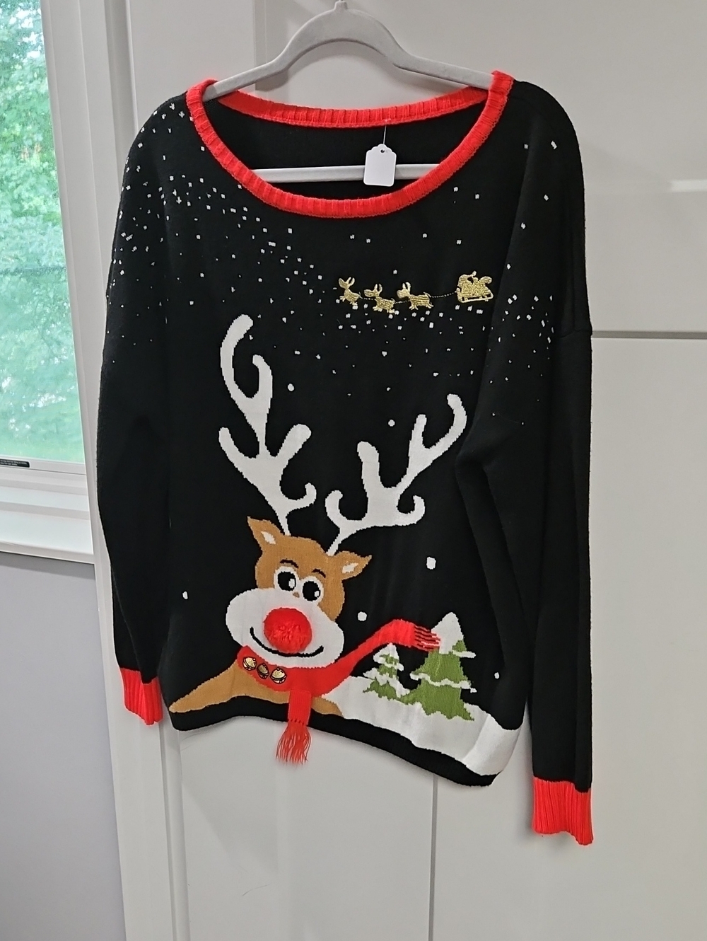 Women's Black Reindeer Holiday Sweater with Red Trim